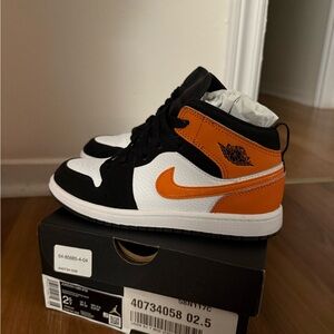 Nike Kids' Black, White, and Orange Sneakers